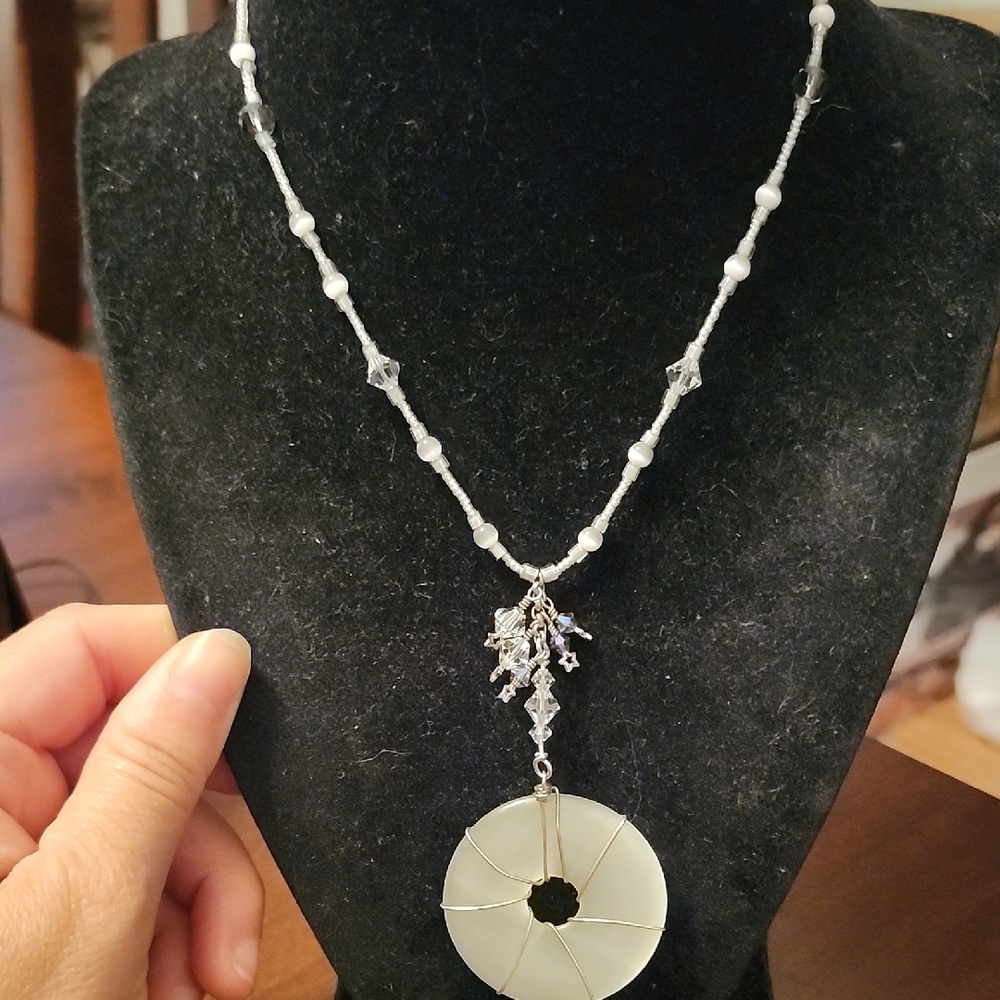 Elegant White Bead Necklace with Circular Pendant